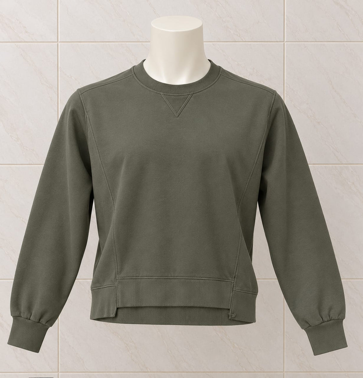 Olive grey plain crew neck sweatshirt with long sleeves, ribbed cuffs and hem on a mannequin