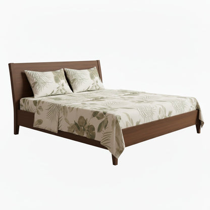 Tropical Leaf Double Bedsheet Set with large sage green monstera and palm leaf print on white background, styled on a dark wood double bed with matching pillow covers