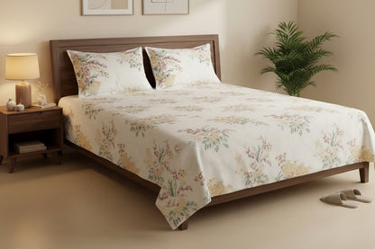 Blossom Bouquet King Bedsheet Set with soft watercolor cream dahlia and blush pink floral bouquets on white background, styled on a dark wood king bed with two matching pillow covers
